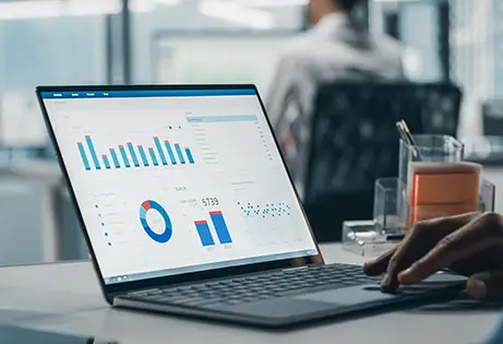 Computer with charts on the screen - Widebase Limited