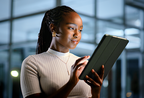 Mayberry Research - Woman looking at a tablet